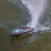 The Recoil 2 V2 26" Self-Righting Brushless Deep-V RTR in "Shreddy" design is a remote-controlled boat designed for exhilarating water adventures